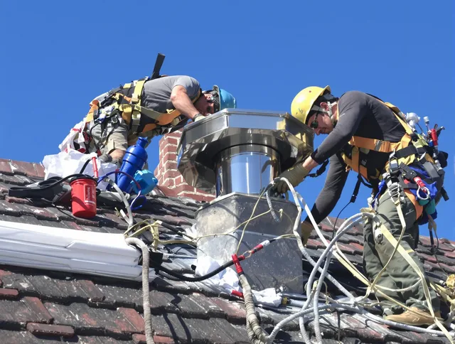 Protective chimney cap installed by University Heights Chimney Sweep in University Heights, OH