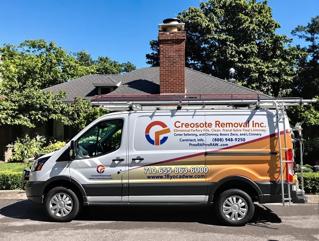 University Heights Chimney Sweep technician removing creosote safely in University Heights, OH