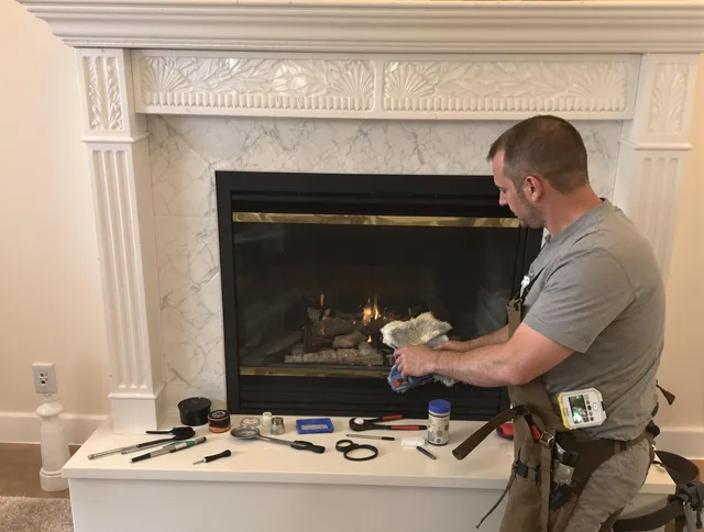 University Heights Chimney Sweep performing fireplace maintenance in University Heights, OH
